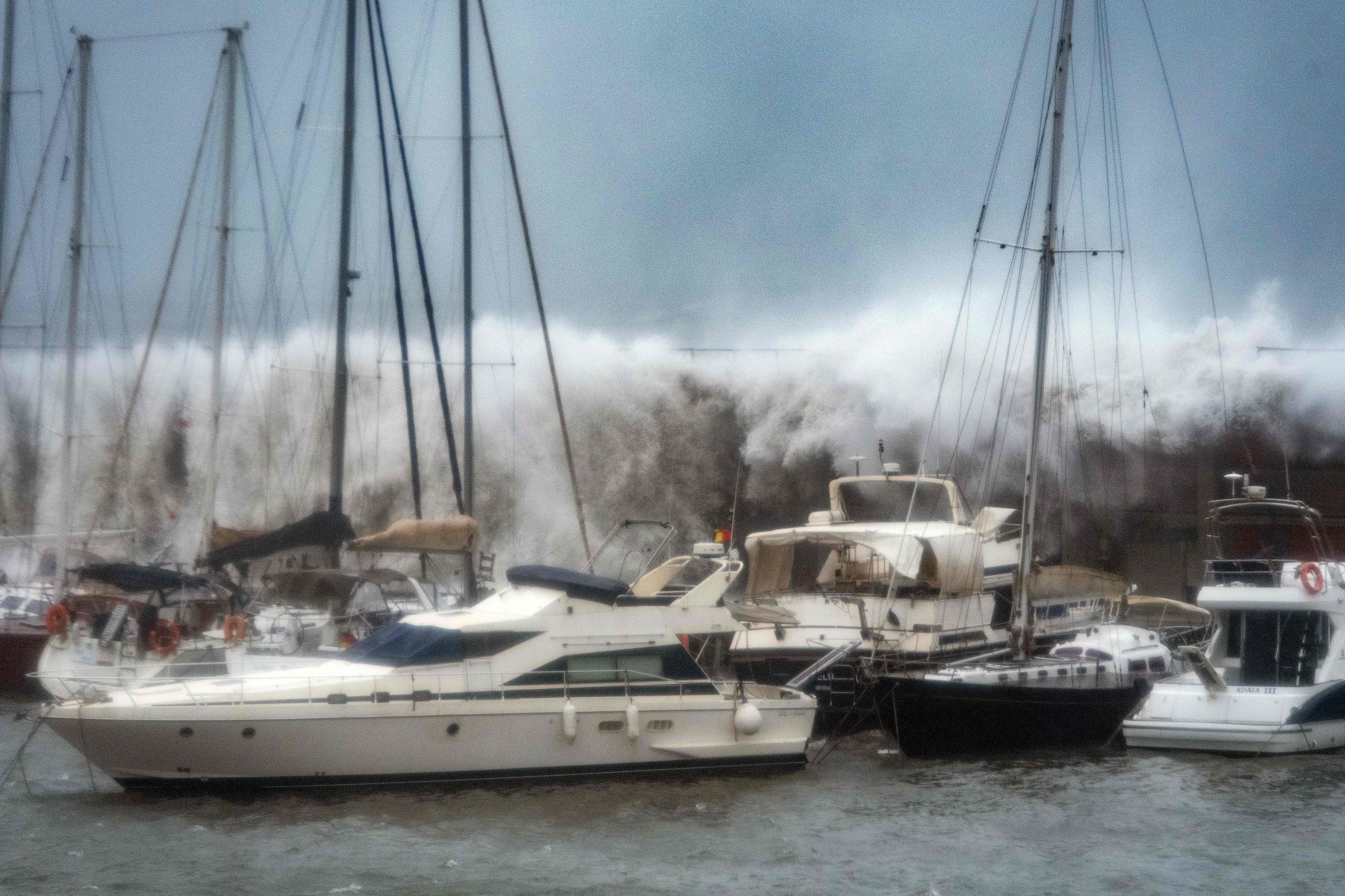 Giant waves pound Port Olympic marina in Barcelona as Gloria batters Spanish eastern coast